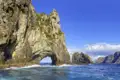 Durch das Hole in the Rock auf Motukokako oder Piercy Island in Neuseeland fahren wir auf dieser Neuseelandreise mit dem Boot!