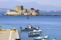 Der Hafen von Nauplia lädt bei unserer Gruppenreise durch Griechenland zum Flanieren ein. Dabei fällt der Blick auf die Bourtzi-Festung.
