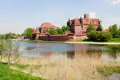 Auf unserer Studienreise durch Polen besuchen wir die majestätische Marienburg (Malbork), eine der mächtigsten Burgen des Mittelalters.