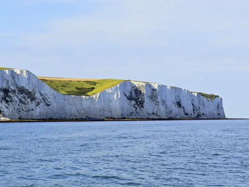 Die Kreidefelsen der White Cliffs of Dover sind eine ikonische Landmarke. Wir machen dort einen Spaziergang auf unserer Rundreise durch Südengland.