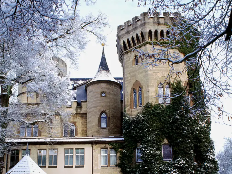 Besuchen Sie das verschneite Schloss Landsberg gemeinsam mit Ihrer Gruppe auf Ihrer Eventreise.